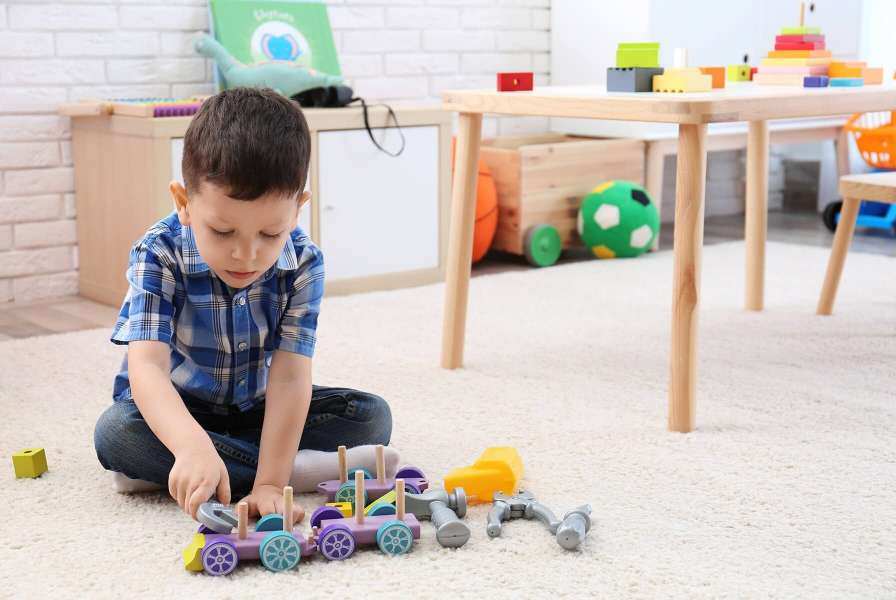 Boy playing with toys